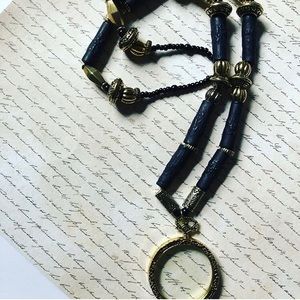 necklace with magnifying glass pendant
